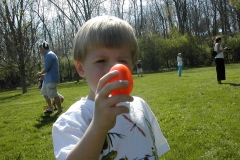 03-Egg-Hunt-little-boy-with-egg